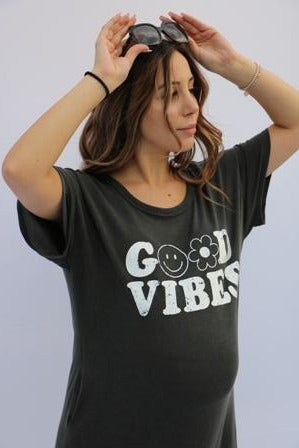 Women's solid dark grey maxi dress with side pockets and "Good Vibes" print