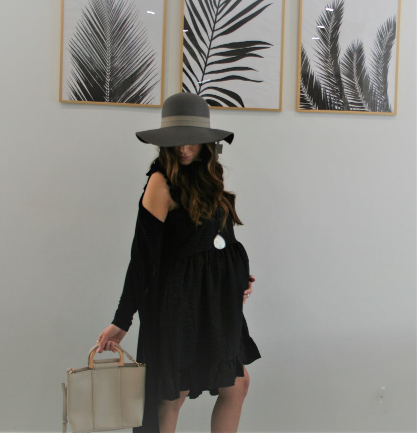 Women's Black Flowy Maternity & Post natal mini dress with ruffle hem and sleeves