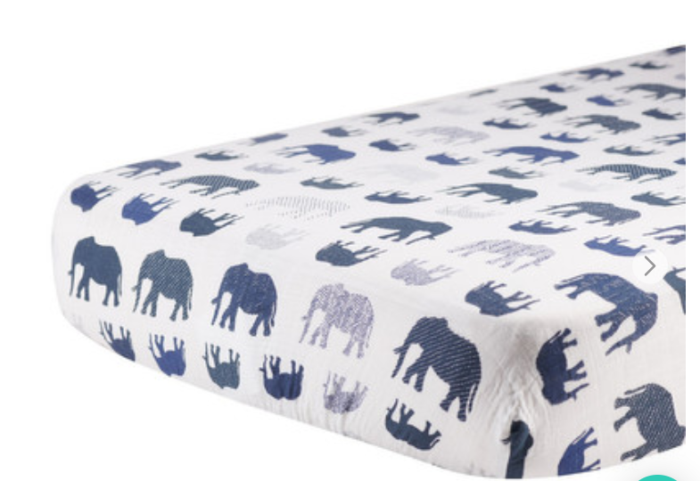 Baby's Natural cotton muslin crib sheet in white with blue and grey elephants, dark grey, herringbone light grey or white and black crosses