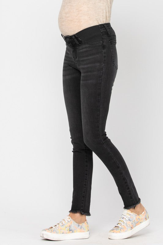 Women's Black Plus Size under the bump skinny leg maternity jeans with frayed ankles