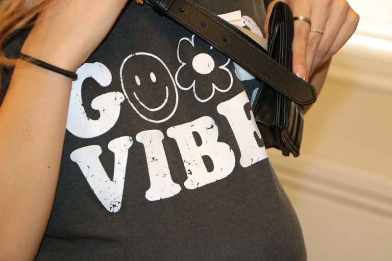Women's solid dark grey maxi dress with side pockets and "Good Vibes" print