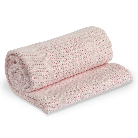Baby's light pink soft cotton knitted lulujo cellular blanket for crib, stroller, playpen and more
