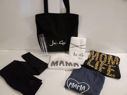 Women's "Mom Bag" Gift set - includes a black canvas tote bag, a white cotton towel, a "Mom Life" plastic water bottle, A black, navy or white cotton "Mama" women's T-shirt and a pair of black women's nylon maternity leggings